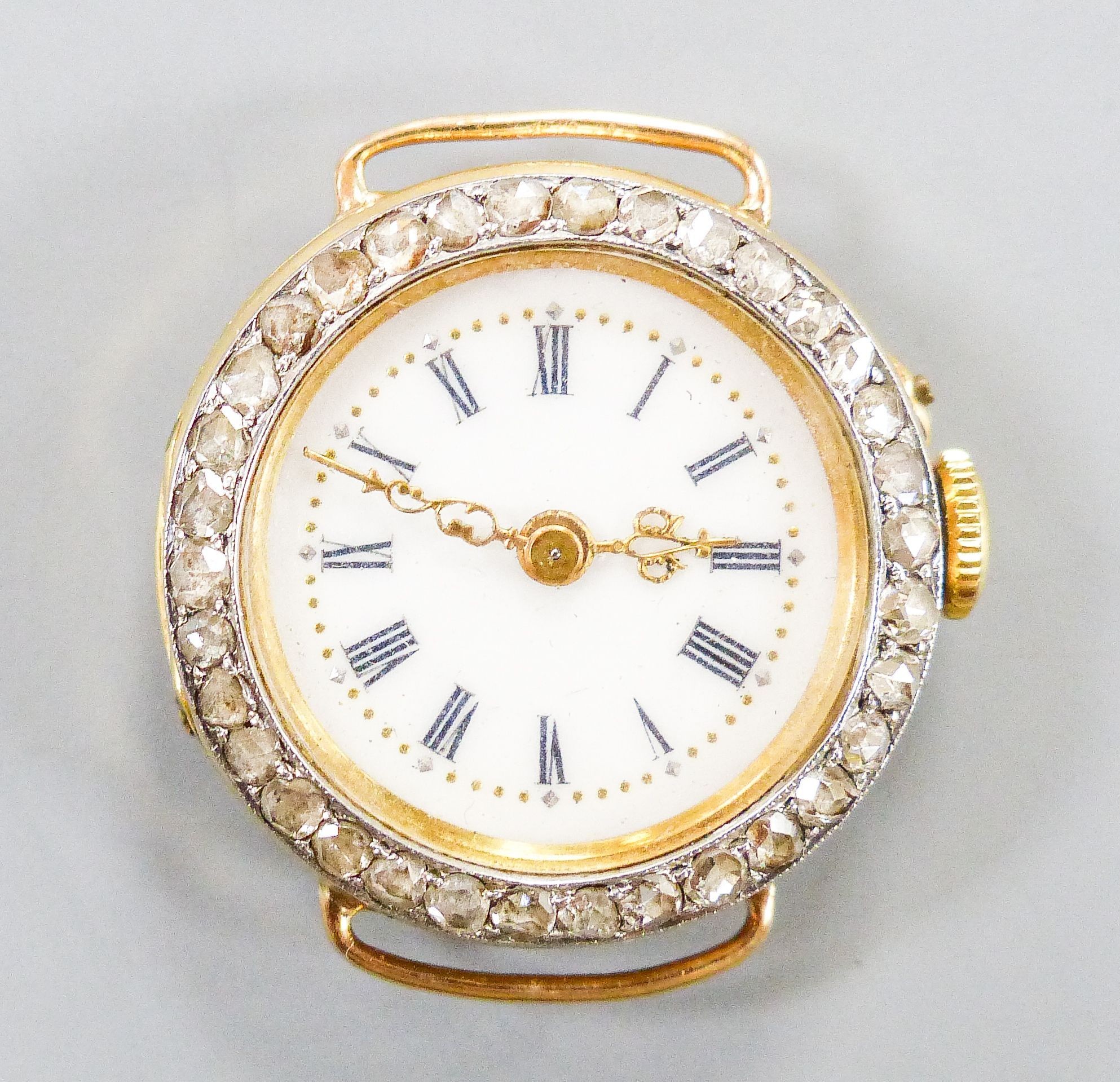 A lady's continental 18k and rose cut diamond set manual wind wrist watch, case diameter 26mm, gross weight 18 grams.